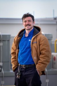 Ed Coddington smiles proudly after taking home Gold in the HVAC competition.