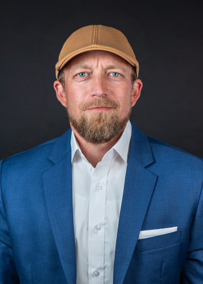A portrait of Adam Trowbrudge - Vice President of Safety