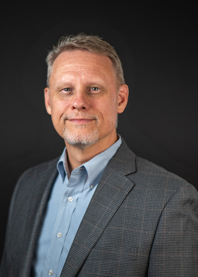 A portrait of Brian Mullen, Controller