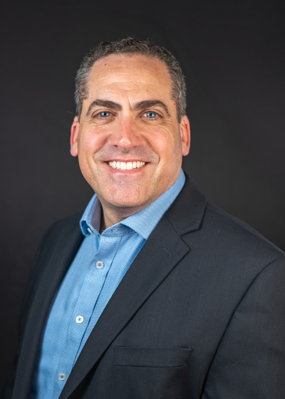 A portrait of Brett Mutnick, President of our Construction Group