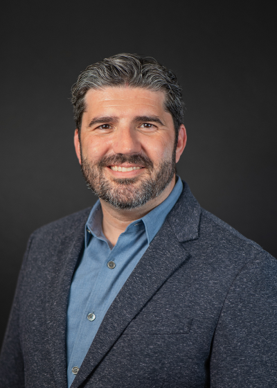 A portrait of Andy Popovici, VP of Service